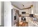 Bright kitchen featuring stainless steel appliances and granite countertops at 70 Grove Creek Dr, Locust Grove, GA 30248