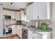 Beautiful kitchen featuring granite countertops and modern appliances at 70 Grove Creek Dr, Locust Grove, GA 30248