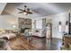 Inviting living room with stone fireplace and lots of natural light at 70 Grove Creek Dr, Locust Grove, GA 30248