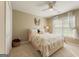 Bright bedroom with a ceiling fan, a double bed, and a sunny window at 891 Berryman Pl, Lawrenceville, GA 30045
