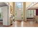 Bright foyer features hardwood floors, high ceilings, and an open view to other rooms at 891 Berryman Pl, Lawrenceville, GA 30045