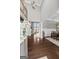 Elegant foyer with soaring ceilings, hardwood floors, and a grand chandelier at 240 Sturry Dr # 71, Mcdonough, GA 30252