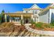 Inviting two-story home with covered porch and landscaped front yard, perfect for relaxing at 240 Sturry Dr # 71, Mcdonough, GA 30252