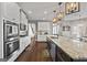 Gourmet kitchen featuring granite countertops, stainless appliances and hardwood floors at 240 Sturry Dr # 71, Mcdonough, GA 30252