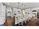 Bright eat-in kitchen features stainless steel appliances, granite countertops and pendant lighting at 240 Sturry Dr # 71, Mcdonough, GA 30252