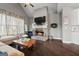 Inviting living room with brick fireplace, vaulted ceilings and designer-selected finishes at 240 Sturry Dr # 71, Mcdonough, GA 30252
