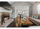 Spacious kitchen looks into living room and fireplace with open-concept design at 240 Sturry Dr # 71, Mcdonough, GA 30252