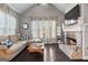 Inviting living room with brick fireplace, vaulted ceilings and designer-selected finishes at 240 Sturry Dr # 71, Mcdonough, GA 30252