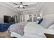 This is the home's main bedroom featuring a walk-in closet, an ensuite bathroom, and a sitting area at 240 Sturry Dr # 71, Mcdonough, GA 30252