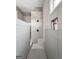 Walk-in shower with gray tile, built in shelf and seat, and dual shower heads at 240 Sturry Dr # 71, Mcdonough, GA 30252
