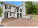 Wooden deck overlooking a beautiful backyard, with black trim matching the home's exterior at 608 Bellenden Dr, Peachtree City, GA 30269