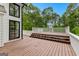 Large wooden deck with white railings, providing ample space for outdoor living and relaxation at 608 Bellenden Dr, Peachtree City, GA 30269
