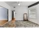 Bright sunroom with stylish flooring and natural light and exit to the back yard at 608 Bellenden Dr, Peachtree City, GA 30269