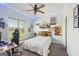 Inviting bedroom with a ceiling fan, plush carpet, and a cozy, comfortable atmosphere at 357 Old Driver Rd, Whitesburg, GA 30185