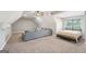 Spacious bonus room with cozy seating, natural light, and a ceiling fan at 357 Old Driver Rd, Whitesburg, GA 30185