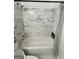 Bathroom featuring a bathtub with marble tile surround at 441 Lilywood Dr, Mcdonough, GA 30253