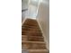 Unfinished stairs leading to the second floor; new owners can add flooring of their choosing at 441 Lilywood Dr, Mcdonough, GA 30253