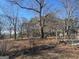 Large, grassy backyard, ready for outdoor activities at 5780 Hill Rd, Powder Springs, GA 30127