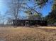 Charming one-story home with a covered front porch on a spacious lot at 5780 Hill Rd, Powder Springs, GA 30127