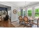 Dining room with backyard access, a chandelier, and stylish furnishings, offering a comfortable and inviting space at 266 Blue Point Pkwy, Fayetteville, GA 30215