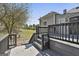 Outdoor deck with stairs, offers a transition to a spacious backyard perfect for relaxing and entertaining at 1449 Wadley Ave, East Point, GA 30344