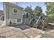 This backyard features a deck and brick patio area, perfect for outdoor entertaining and relaxation at 1449 Wadley Ave, East Point, GA 30344