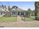 Charming home with a covered front porch and well-maintained landscaping at 1449 Wadley Ave, East Point, GA 30344