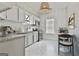 Charming kitchen features modern appliances and bright lighting at 1449 Wadley Ave, East Point, GA 30344
