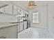 Charming kitchen features modern appliances and bright lighting at 1449 Wadley Ave, East Point, GA 30344