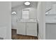 Bright laundry room features a washer and dryer at 1449 Wadley Ave, East Point, GA 30344