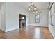 Bright living room features hardwood floors, a decorative fireplace, and modern lighting at 1449 Wadley Ave, East Point, GA 30344
