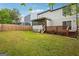 A lawn of grass and patios offer outdoor living space to the home at 2049 Charter Ln, Lithonia, GA 30058