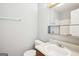 Cozy bathroom featuring a white sink and vanity offering functionality and storage solutions at 2049 Charter Ln, Lithonia, GA 30058
