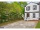Exterior view of townhome with lawn at 2049 Charter Ln, Lithonia, GA 30058
