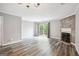 Living room with fireplace and sliding glass doors to outdoor space at 2049 Charter Ln, Lithonia, GA 30058