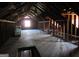 Spacious unfinished attic with exposed beams and natural light at 526 Mount Carmel Church Rd, Temple, GA 30179