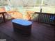 Deck with a stock tank pool/spa, looking out to the backyard and the surrounding trees at 526 Mount Carmel Church Rd, Temple, GA 30179