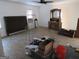 Spacious bedroom with wood-look tile flooring, offering room for various furniture configurations at 526 Mount Carmel Church Rd, Temple, GA 30179