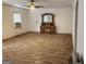 Spacious bedroom with wood-look flooring, classic trim, and natural light creating a serene atmosphere at 526 Mount Carmel Church Rd, Temple, GA 30179
