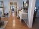 Stylish entryway with decorative furniture, modern decor, and beautiful hardwood floors at 526 Mount Carmel Church Rd, Temple, GA 30179