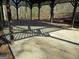 Image shows the concrete flooring and support beams within an old gazebo at 526 Mount Carmel Church Rd, Temple, GA 30179
