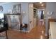 Living room view showcases decorative items, hardwood floors, and a hallway leading to other rooms at 526 Mount Carmel Church Rd, Temple, GA 30179