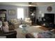 Bright and cozy living room with light gray walls, comfortable seating, and natural light at 526 Mount Carmel Church Rd, Temple, GA 30179