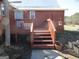Property featuring back porch stairs, with raised garden at 526 Mount Carmel Church Rd, Temple, GA 30179