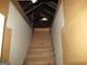 View of the wooden stairs leading to the attic at 526 Mount Carmel Church Rd, Temple, GA 30179