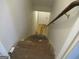 Stairway leading to a lower level with visible flooring at 526 Mount Carmel Church Rd, Temple, GA 30179