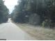 The property features a quiet asphalt street lined with trees at 526 Mount Carmel Church Rd, Temple, GA 30179