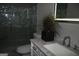 Modern bathroom with glass enclosed shower, stylish fixtures, and sleek vanity at 116 Kalsum Trl, Ellenwood, GA 30294