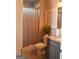 Well-appointed bathroom with decorative wall accents, modern fixtures, and tiled floors at 116 Kalsum Trl, Ellenwood, GA 30294