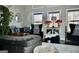Comfortable living area featuring plush seating, decorative pillows, and ample natural light at 116 Kalsum Trl, Ellenwood, GA 30294